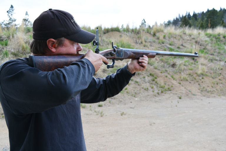 McLaughlin test fires a custom rifle